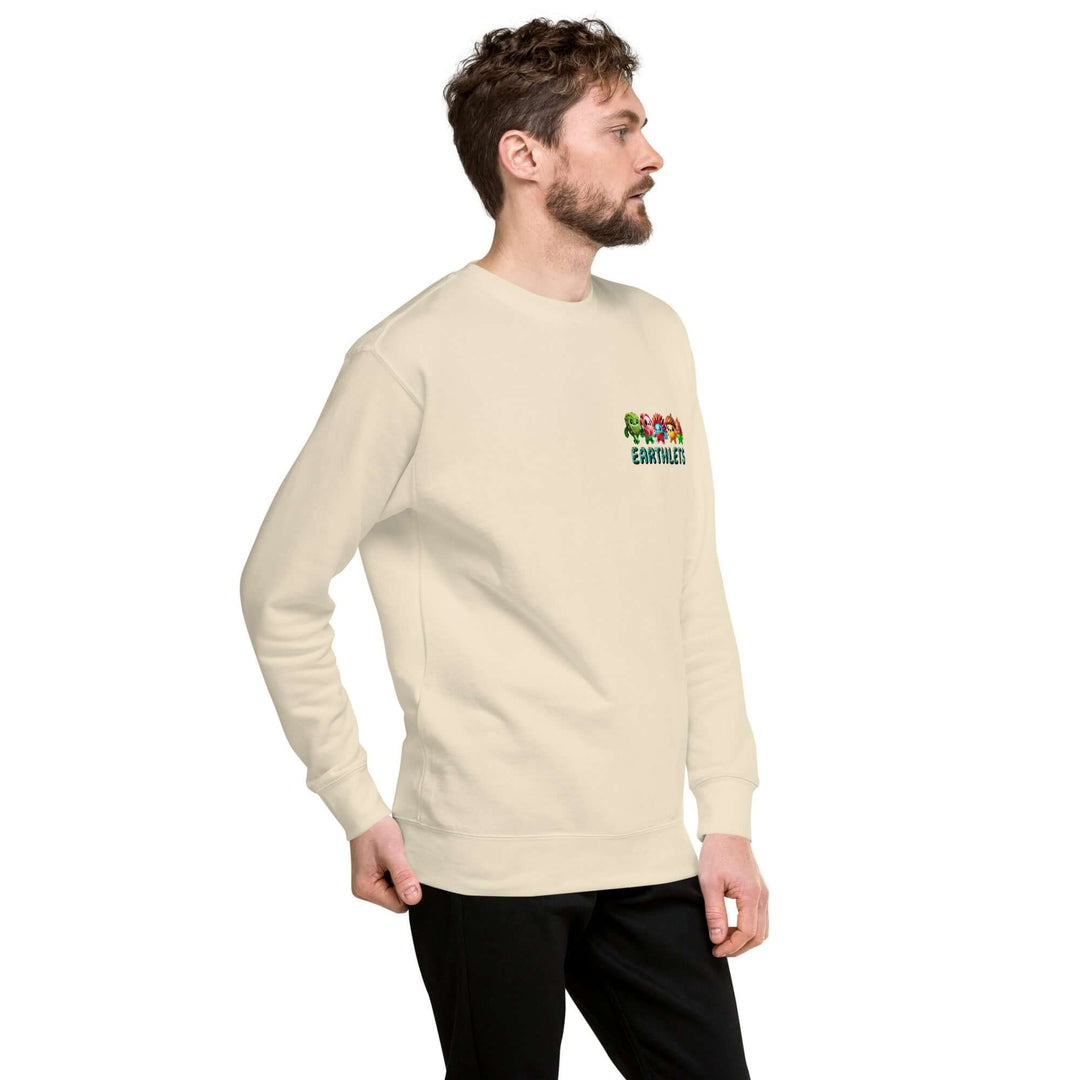 Earthlets Unisex Premium Sweatshirt model wearing light-colored sweatshirt with graphic design on the chest.