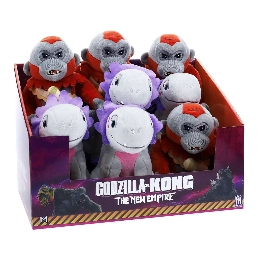 Godzilla x Kong The New Empire plush collection featuring vibrant, cute monsters in a display box.