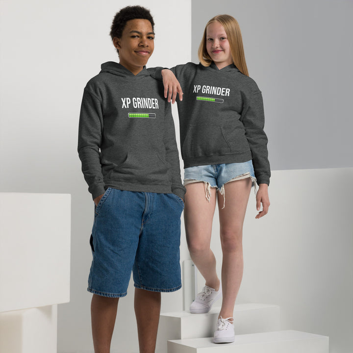 Two kids wearing XP Grinder Youth heavy blend hoodie, showcasing comfort and style.