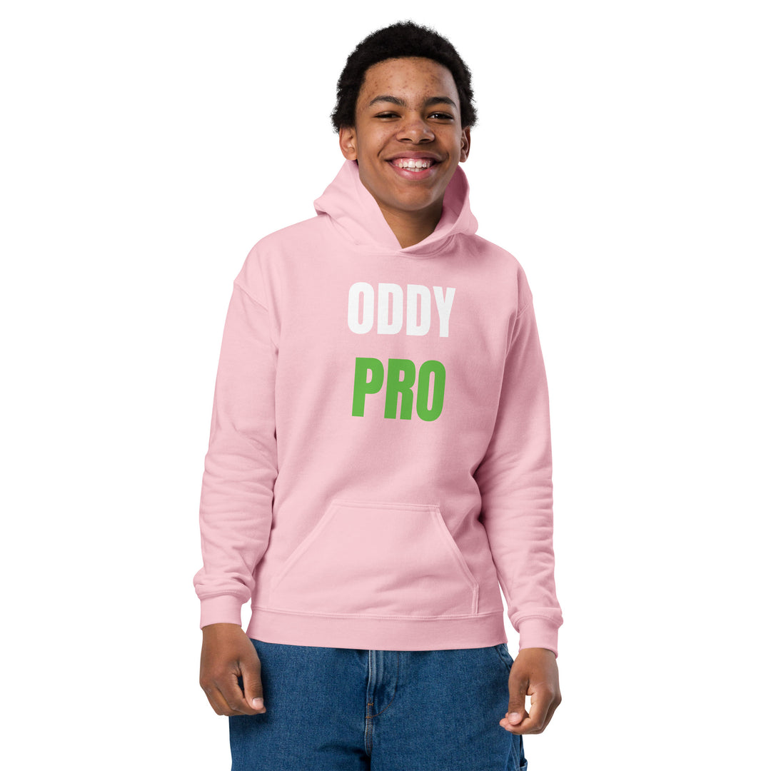 Boy wearing Oddy Pro Youth heavy blend hoodie in pink with front pouch pocket.